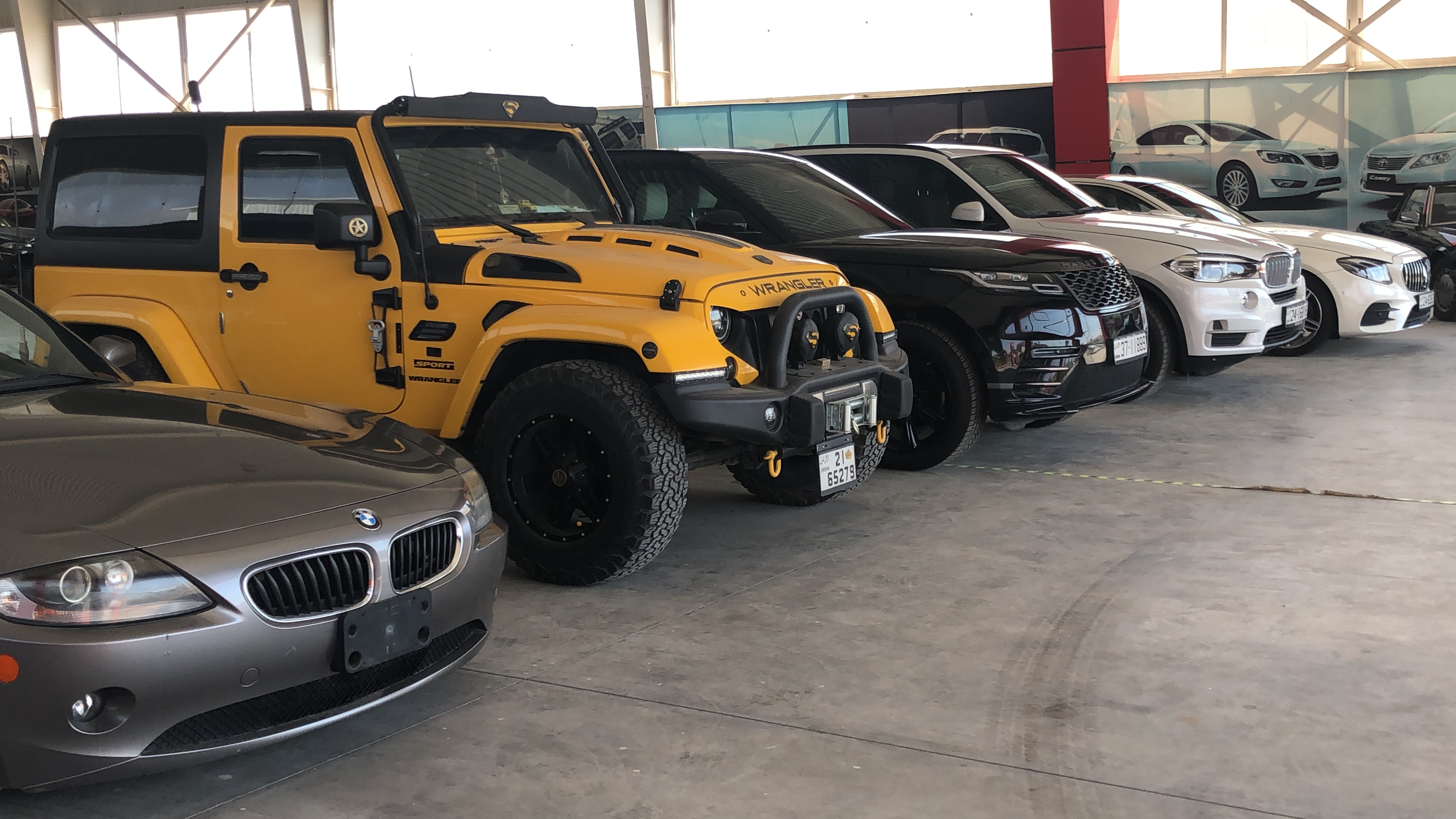 Luxury Cars — Jeep Wrangler, BMW, Range Rover